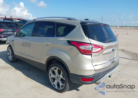 2017 Ford Escape Titanium z USA, uszkodzony, nr VIN 1FMCU0J99HUA03820